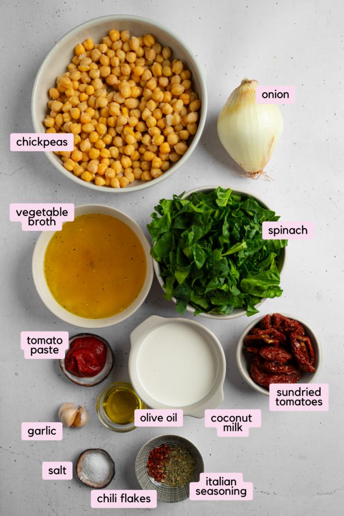 Ingredients for Marry Me Chickpeas laid out and labeled on a light background.