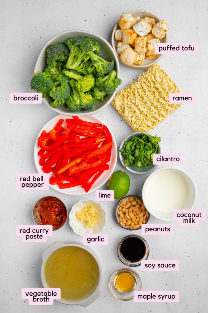 Ingredients for the creamy Thai red curry noodles laid out and clearly labeled on a white background.