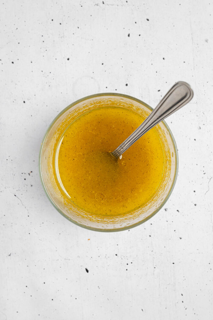 Golden vinaigrette dressing for the Vegan couscous salad with feta and mint.
