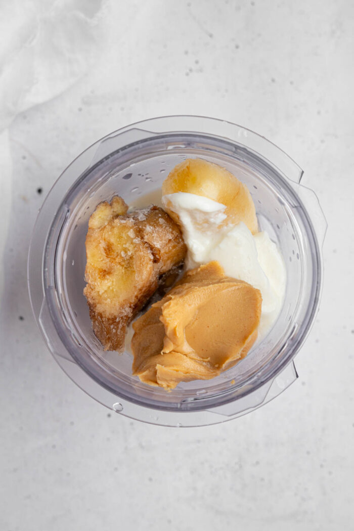 Ingredients for the healthy homemade ice cream bars together in a high-speed blender.