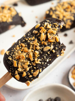 Healthy homemade ice cream bar with a bite taken out.