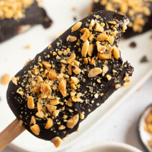 Healthy homemade ice cream bar with a bite taken out.