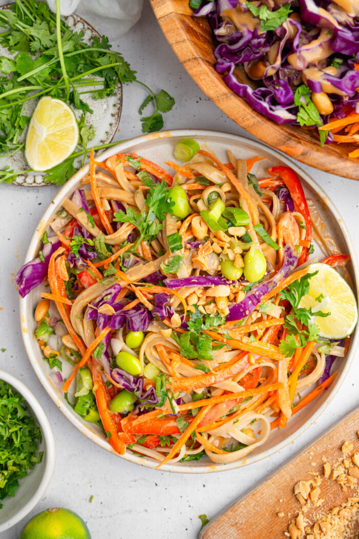 Thai noodle salad served in a large bowl, photographed from above.