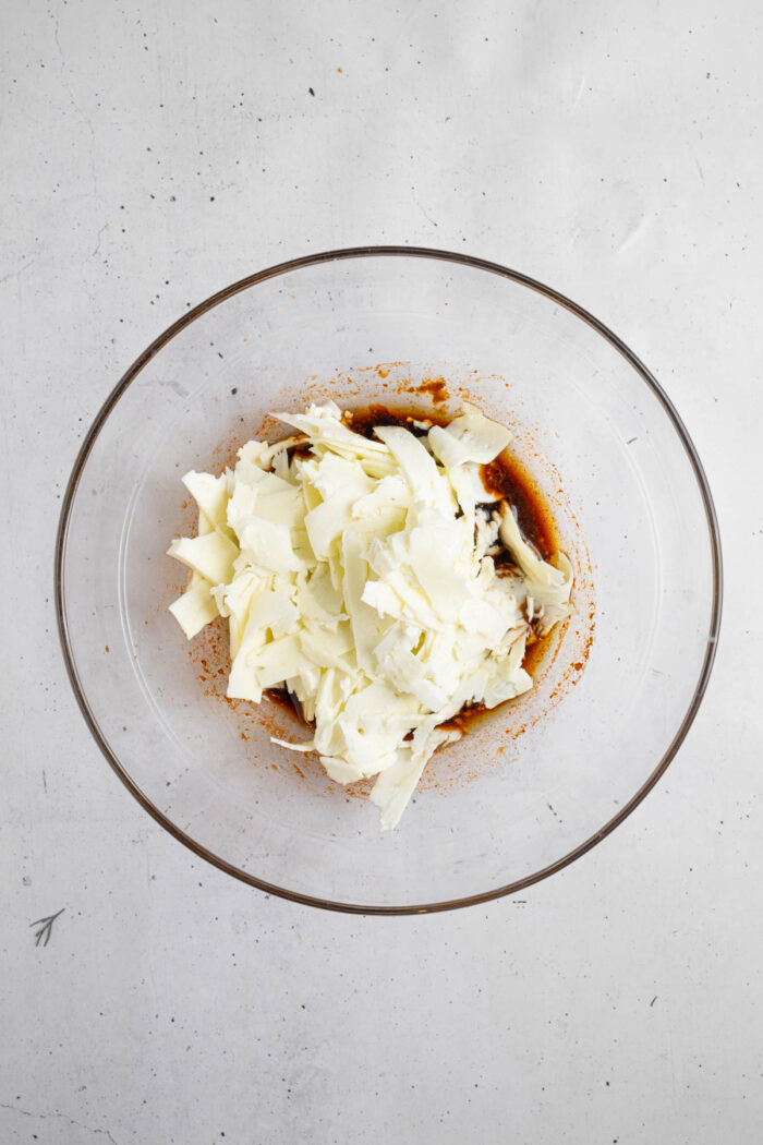 Tofu ribbons mixed in with the marinade.