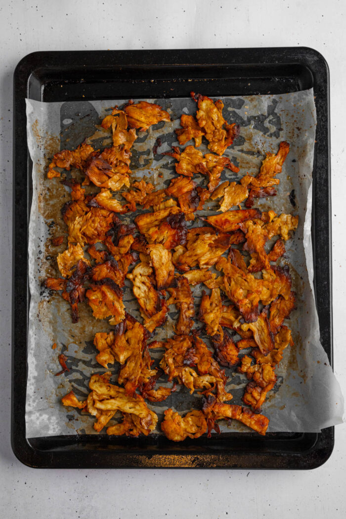 Roasted marinated tofu that is styled and flavored to resemble shawarma "meat".