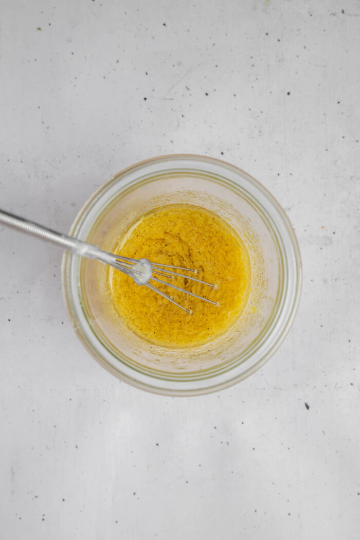 Chosen Foods Lemon Garlic Dressing in a small bowl.