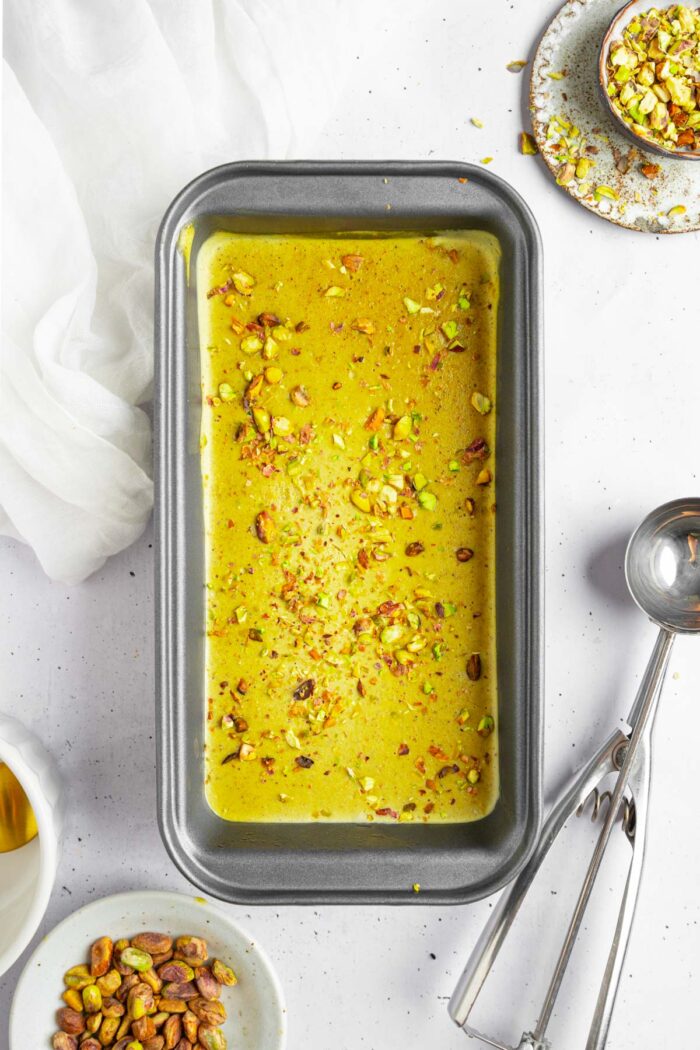 Vegan pistachio ice cream, freshly removed from the freezer.