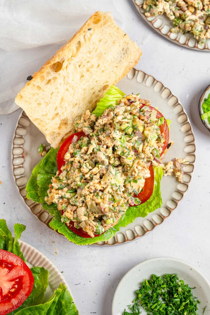 Top down view of a vegan chicken salad sandwich, showing off the filling.