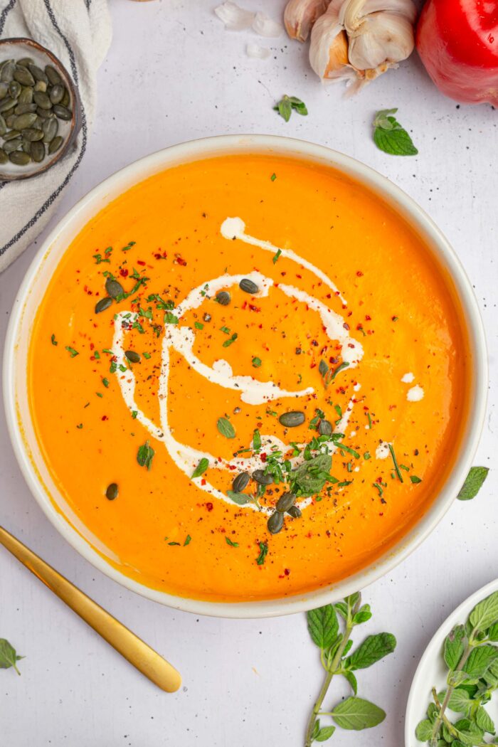 Top down view of roasted red pepper carrot soup.