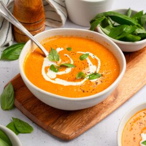 A serving of vegan high protein soup in a white ceramic bowl.