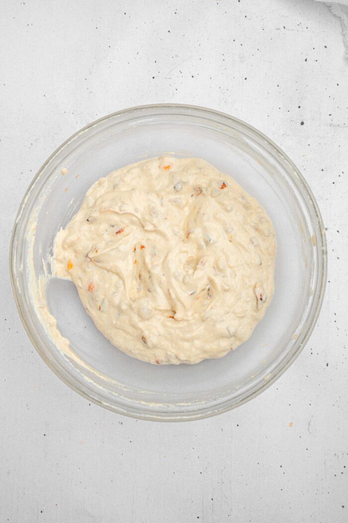 The blended creamy caramelized onion dip base mixed with the onions.