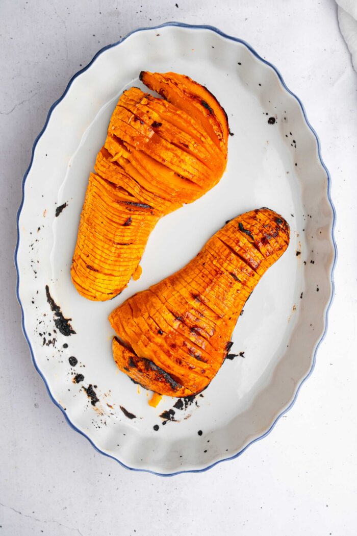 Roasted hasselback butternut squash freshly out of the oven.