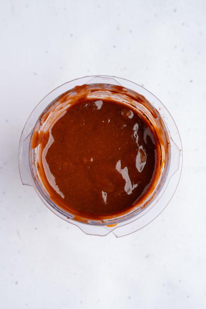 The persimmon and cocoa mixture after blending, still in the blender.