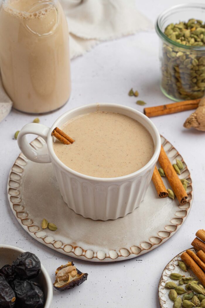 Warm date milk served with cinnamon.