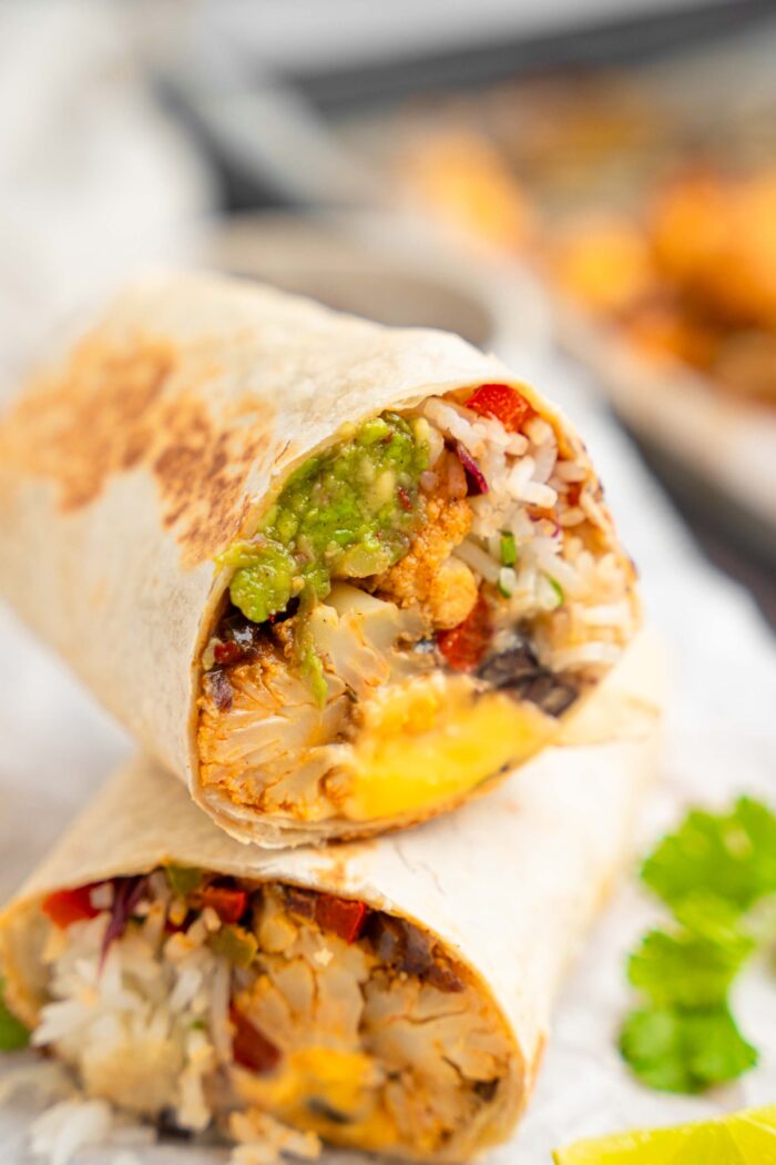 A close up of the cauliflower burrito half, showing off the filling.