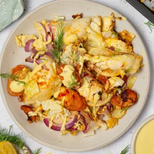 A close top-down view of the sheet pan pierogies served on a plate.