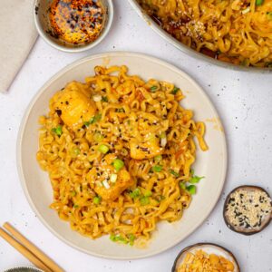 Chili oil peanut noodles served with fresh scallions.