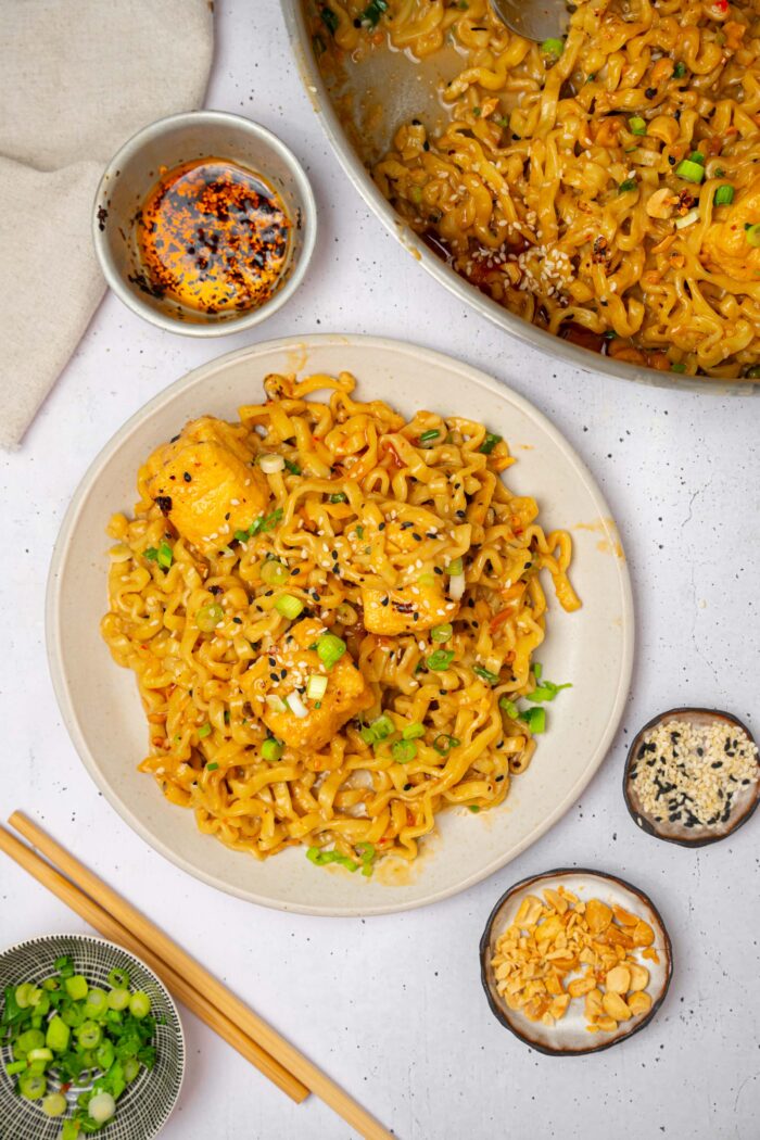 Chili oil peanut noodles served with fresh scallions.