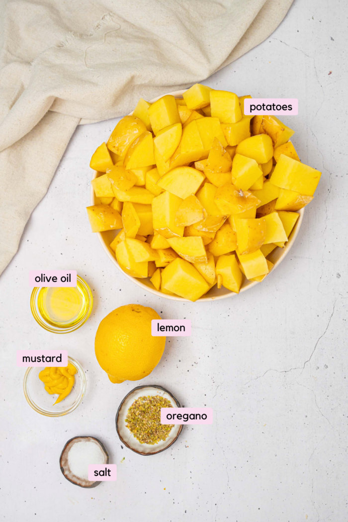 The ingredients for shaken potatoes laid out and labeled on a white background.