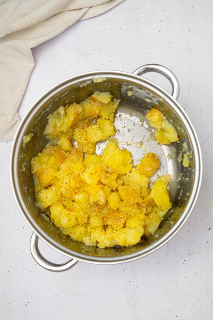 Shaken boiled potatoes with lemon, mustard, dried herbs, and olive oil.