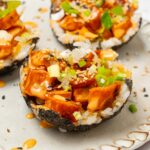 A close up of one of the sushi cups, showing off the sweet potato filling and toppings.