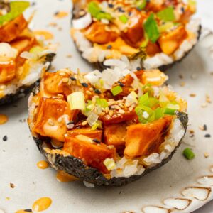 A close up of one of the sushi cups, showing off the sweet potato filling and toppings.
