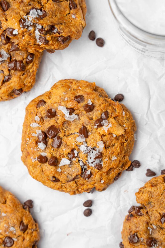 A close up shot of a vegan protein cookie with some flaky salt.