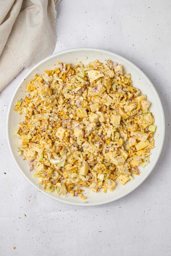 Shredded tofu, mixed with apples, celery, walnuts, red onion, and the creamy vegan dressing.