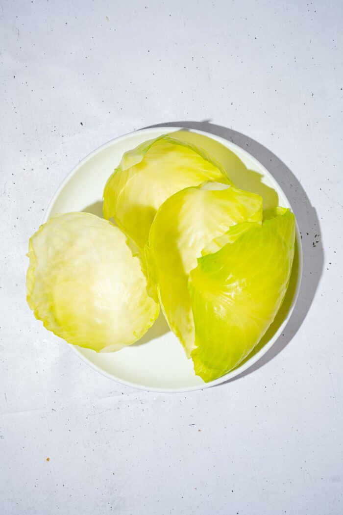 Cabbage leaves separated from the head after cooking.