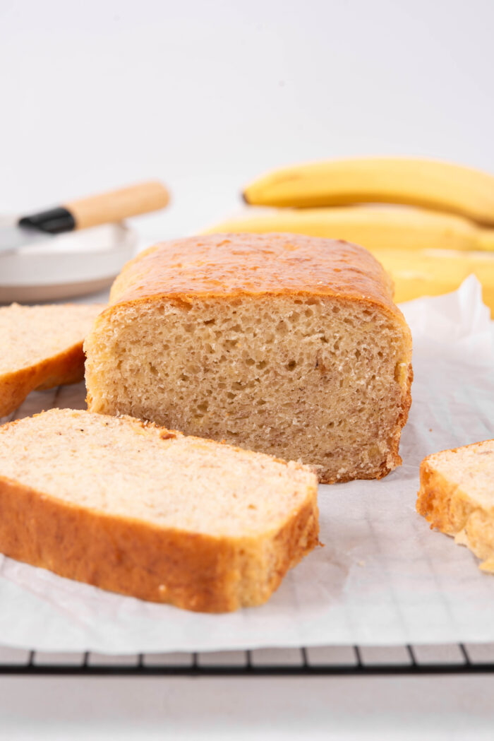 Easy vegan banana bread, baked to perfection and sliced to show off the inside.
