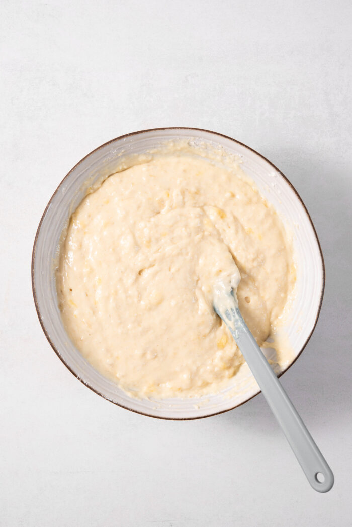 The easy vegan banana bread batter in a mixing bowl.