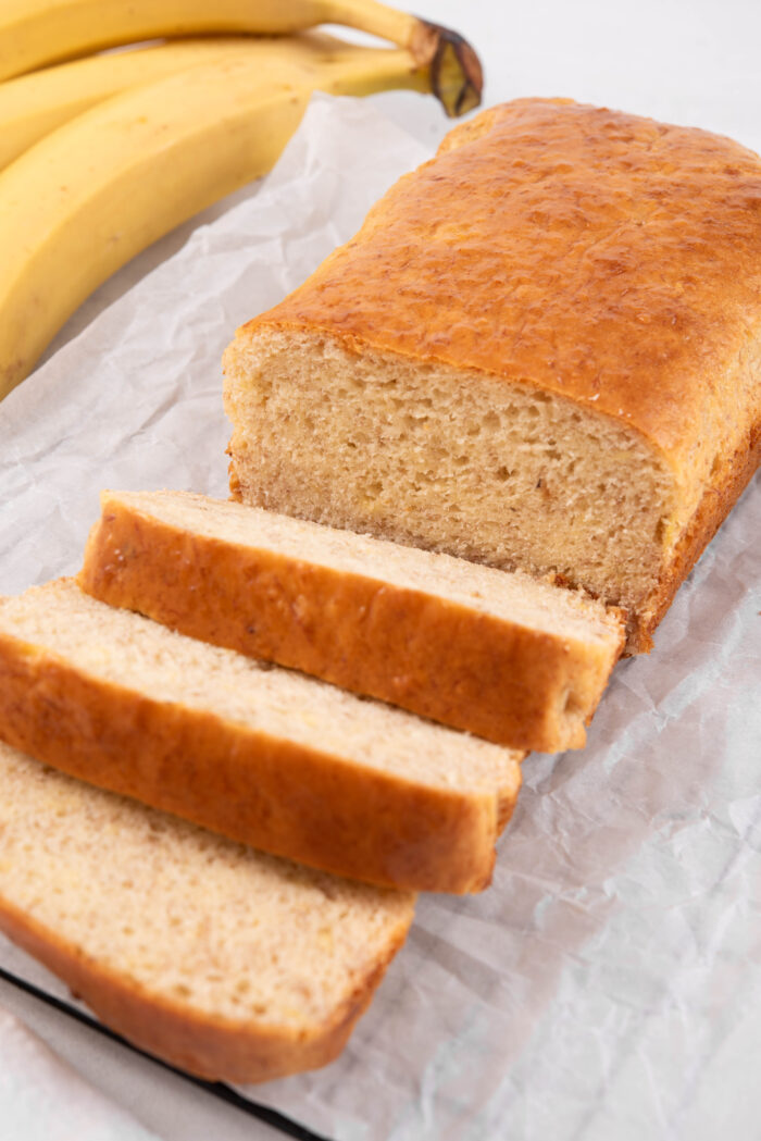 A close up of the easy vegan banana bread sliced into one end.